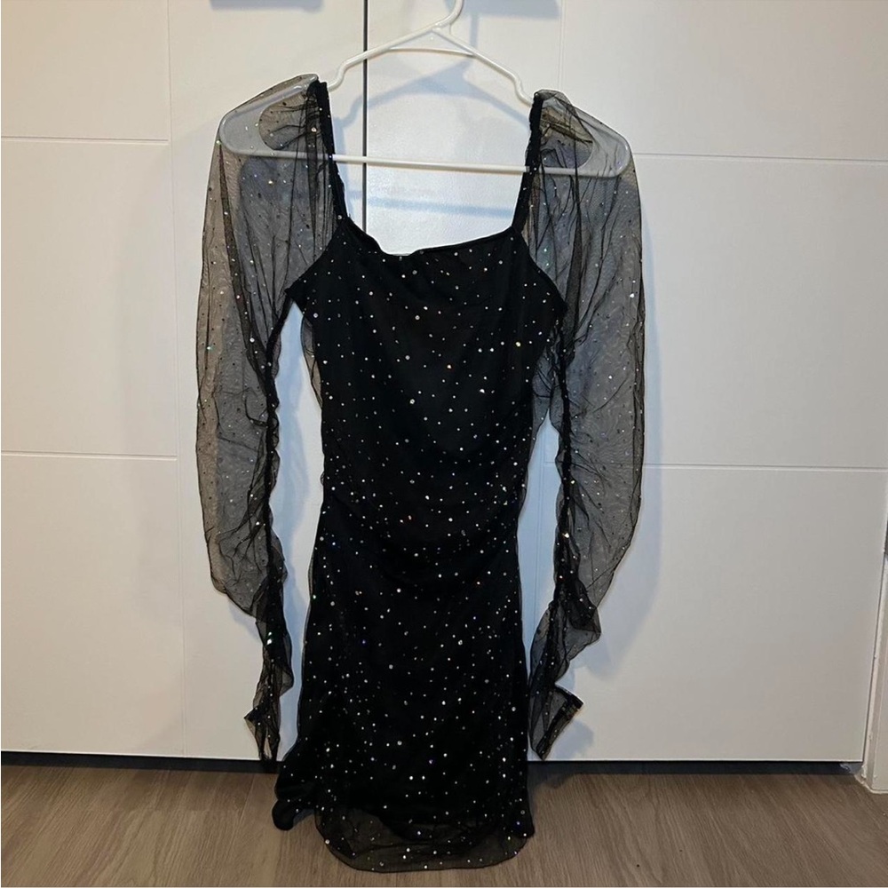 Elegant Black Dress with Sheer Sleeves